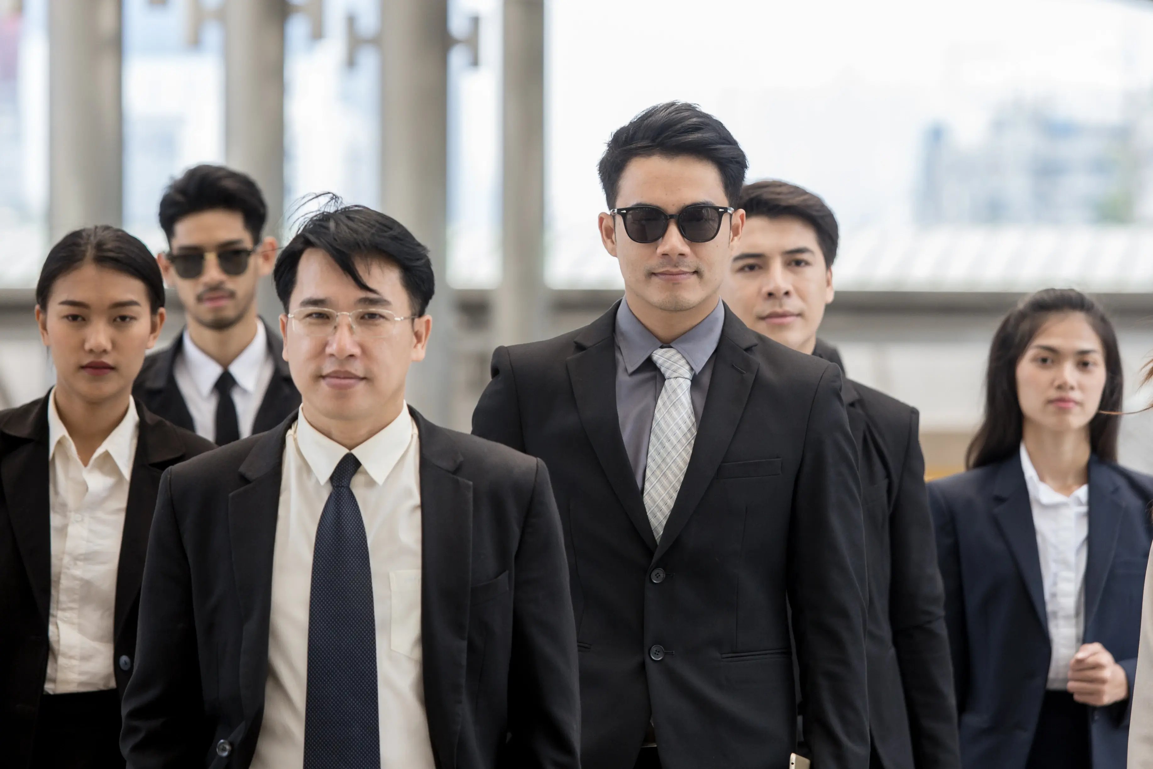 team-of-asian-businesspeople-man-and-woman-busines-2026-01-11-09-13-31-utc